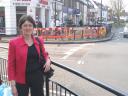 Lib Dem campaigner Lorraine Collier highlights the county council’s failiure to repair Epping High Street’s broken railings
